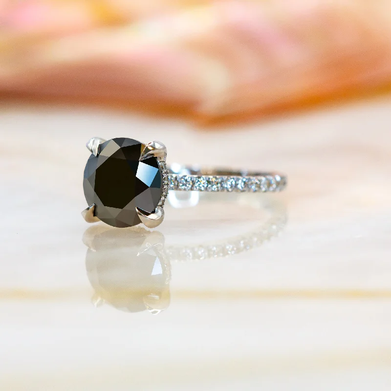 Princess - Cut Women's Diamond Rings in White Gold with a High - Clarity Diamond for a Modern LookGravastar  -   Black & White   Natural Black Diamond Round Engagement Ring  in White  Gold