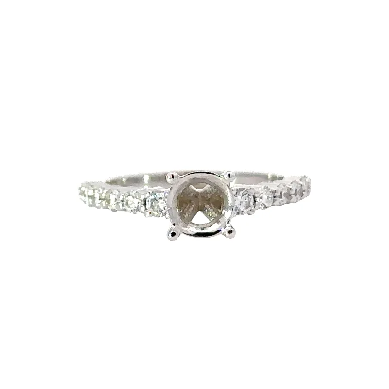 Halo - Style Women's Diamond Rings with a Center Diamond Surrounded by Smaller Diamonds in 18K GoldClassic Diamond Ring Setting