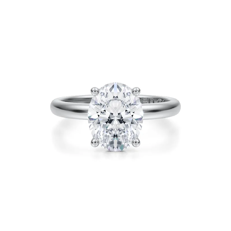 Men's Sapphire Engagement Rings in 18K White Gold with Pave Diamond AccentsThree-Carat Oval Brilliant Diamond Solitaire Engagement Ring