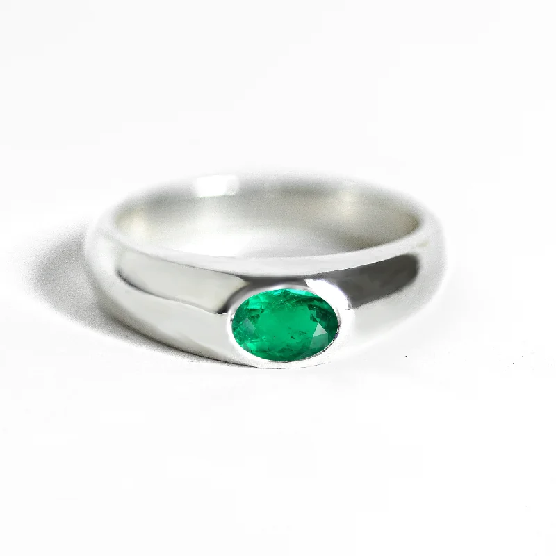 Men's Diamond Engagement Rings with Platinum Band and Halo Setting for a Luxury ProposalOval Emerald Signet Ring