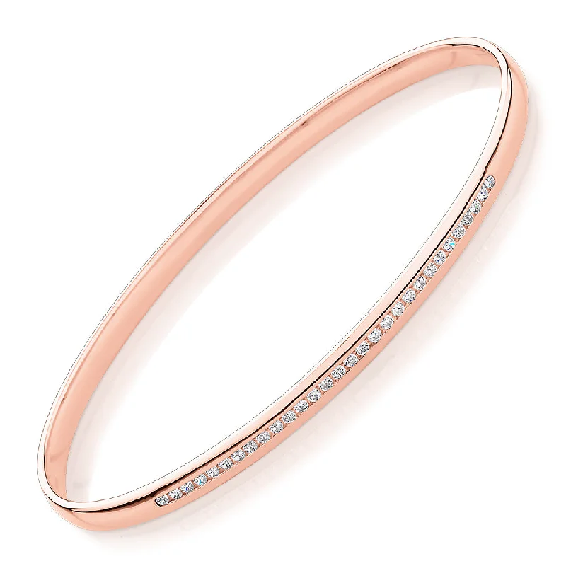 Enamel - Coated Bangles in Vibrant Rainbow Colors for a Playful StyleOval bangle with 0.45 carats* of diamond simulants in 10 carat rose gold