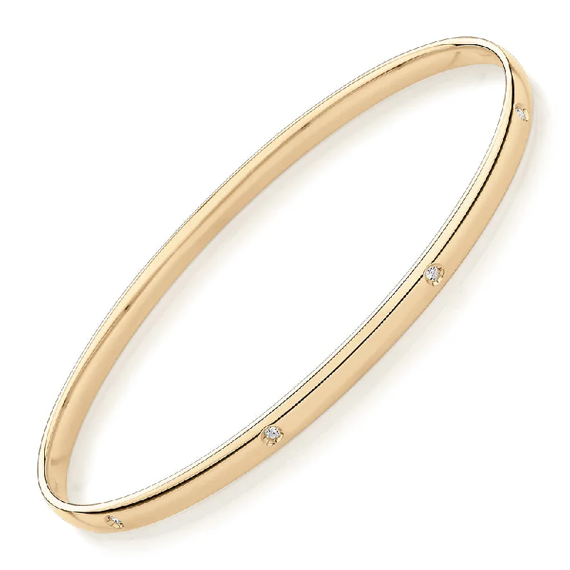 Stretch Bangle Bracelets with Elastic Cord for a Comfortable FitOval bangle with diamond simulants in 10 carat yellow gold