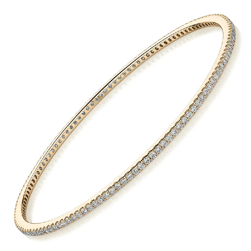 Solid Gold Bangles with Intricate Floral Engravings for a Luxurious LookSignature Simulant Diamond 2 carat* TW round brilliant bangle in 10 carat yellow gold