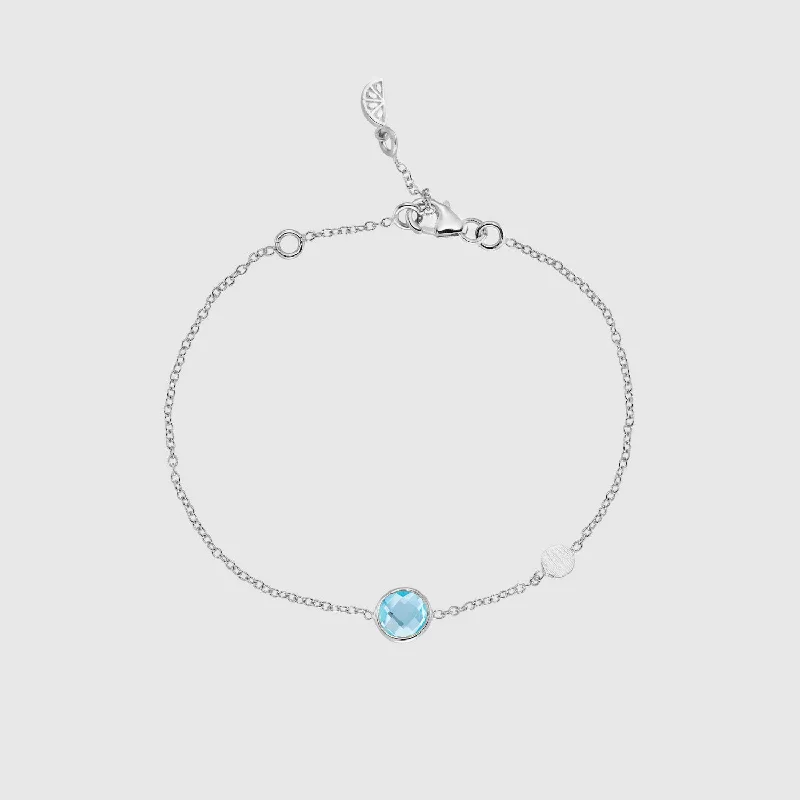 Plus Size Women's Wide Bangle Bracelets in Matte Finish for a Statement PieceSalina Blue Topaz and Silver Disc Bracelet