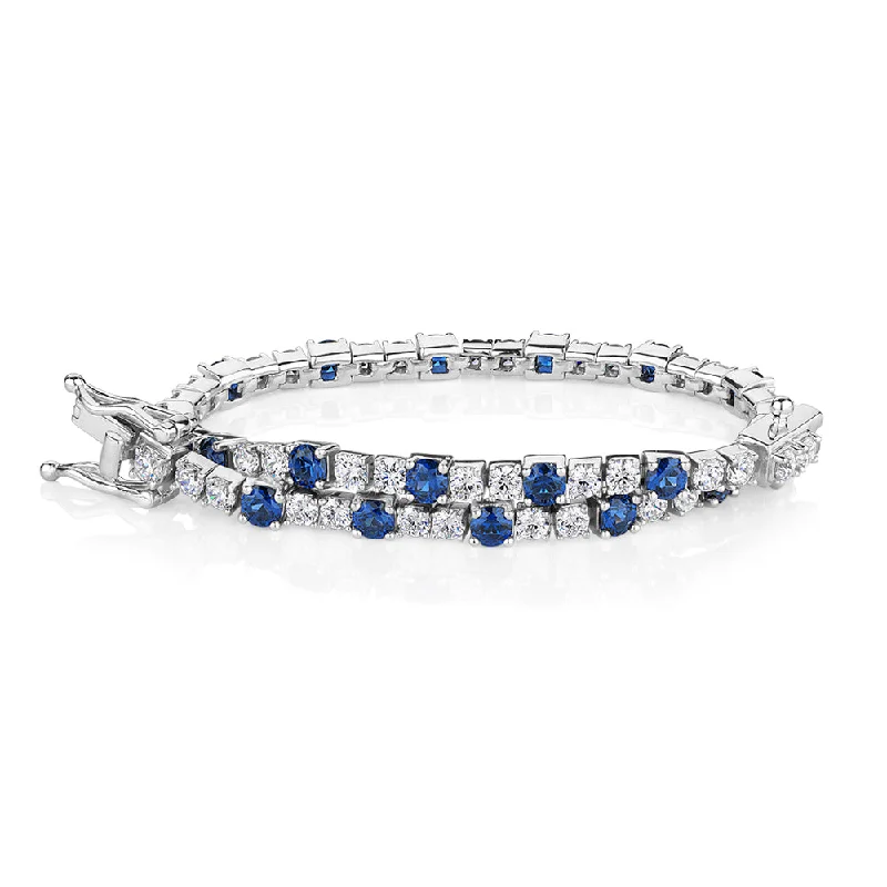 Vintage - Inspired Bangle Bracelets with Filigree and Rhinestone AccentsRound Brilliant tennis bracelet with sapphire simulants and 3.28 carats* of diamond simulants in sterling silver