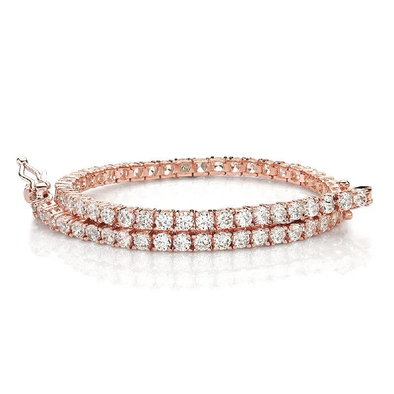 Pearl - Adorned Bangle Bracelets with Delicate Silver ChainsRound Brilliant tennis bracelet with 4.02 carats* of diamond simulants in 10 carat rose gold