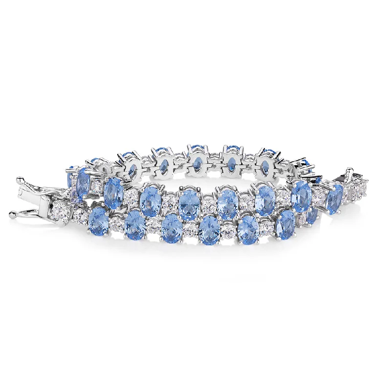 Children's Bangle Bracelets with Animal - Shaped Charms for a Cute AccessoryOval and Round Brilliant tennis bracelet with blue topaz simulants and 3.26 carats* of diamond simulants in sterling silver