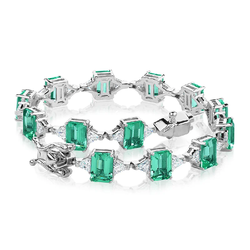 Bangle Bracelets with Adjustable Screw - Closures for a Secure FitEmerald Cut and Trilliant tennis bracelet with ocean green simulants and 3.12 carats* of diamond simulants in sterling silver