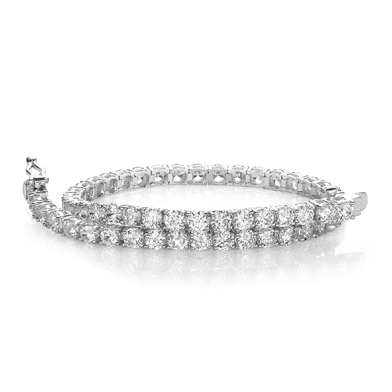 Rose Gold - Plated Bangles with Cubic Zirconia for a Glamorous TouchRound Brilliant tennis bracelet with 6.27 carats* of diamond simulants in 10 carat white gold