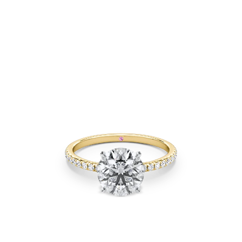 Cathedral - Style Engagement Rings with a Raised Center Stone and Intricate MetalworkRound Diamond Engagement Ring