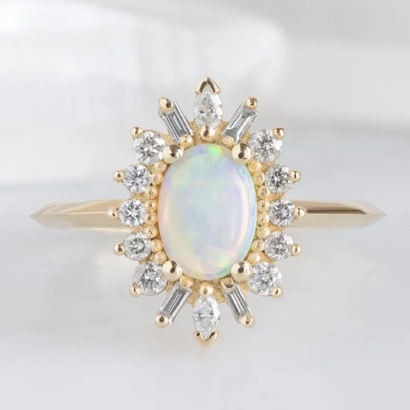 Cathedral - Style Engagement Rings with a Raised Center Stone and Intricate MetalworkThe Camellia Ring | 0.38ct Oval Australian Opal in 14K Yellow Gold