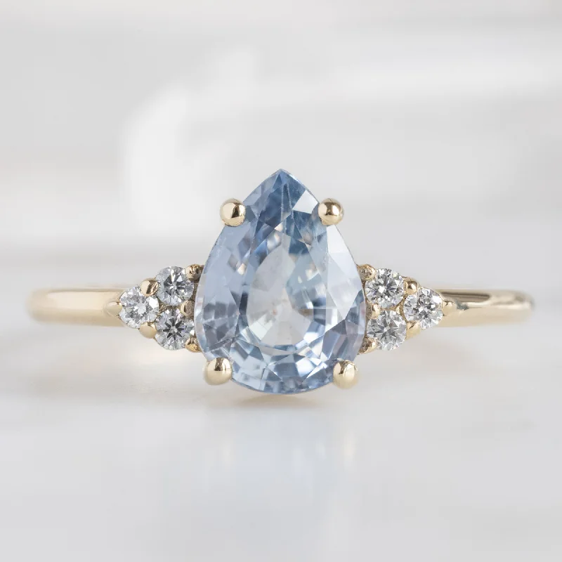 Vintage - Inspired Engagement Rings with Filigree Work and Emerald - Cut Center StoneThe Ivy Ring | 1.5ct Pear Cut Sapphire in 14K Yellow Gold