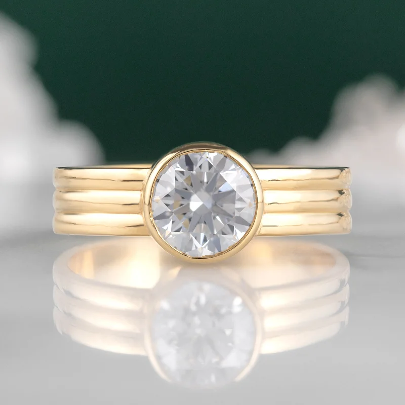 Cathedral - Style Engagement Rings with a Raised Center Stone and Intricate MetalworkThe Stratum Ring | 1.35ct Lab Grown Round White Diamond in 18K Yellow Gold