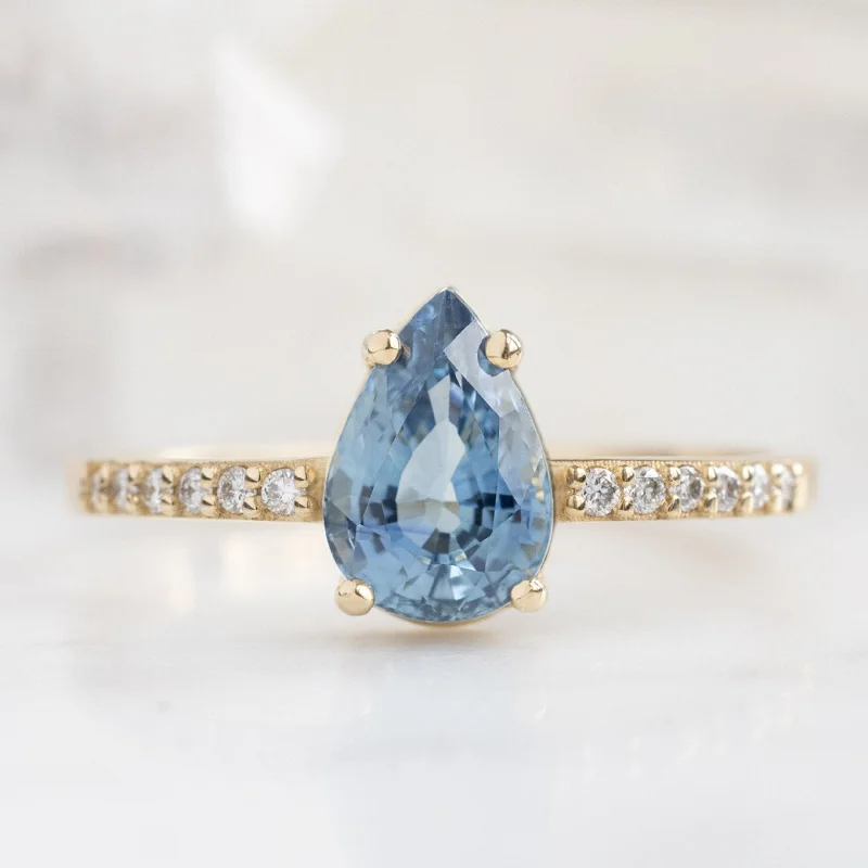 Art Deco Engagement Rings with Geometric Patterns and Baguette - Cut Diamond AccentsThe Willow Ring | 1.18ct Pear Blue Sapphire in 14K Yellow Gold