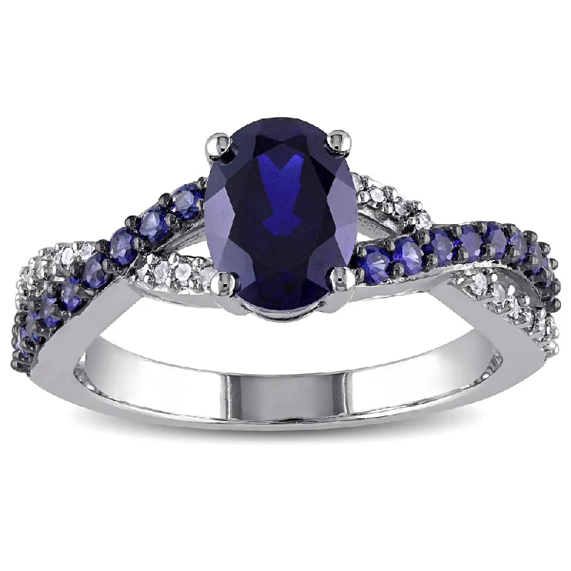 Alexandrite Gemstone Rings in Platinum with a Hidden Halo for a Rare and Luxurious PieceMiadora 10k White Gold Created Blue Sapphire and 1/10ct TDW Diamond Ring (H-I, I2-I3)