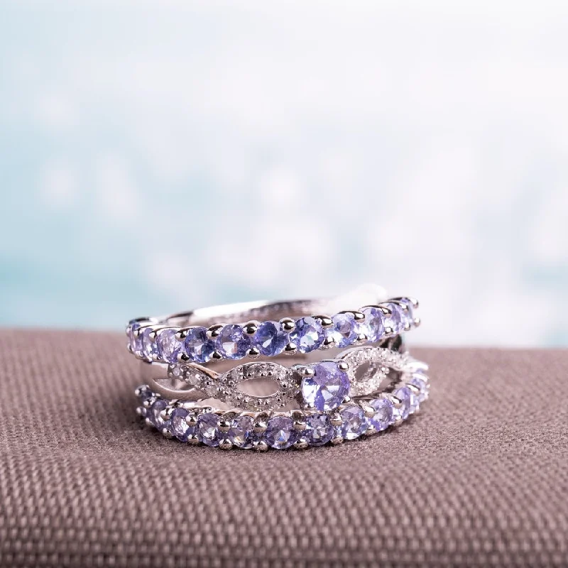 Iolite Gemstone Rings in 10K Gold with a Twisted Band for a Distinctive and Stylish AccessoryMiadora Sterling Silver Tanzanite and 1/10ct TDW Diamond 3-piece Stackable Ring Set (G-H, I2-I3)