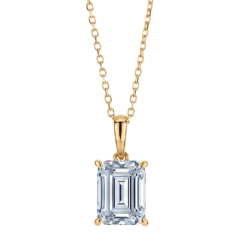 Adjustable length necklaces for versatilityEmerald Cut and Round Brilliant solitaire pendant with 1.81 carats* of diamond simulants in 10 carat yellow gold