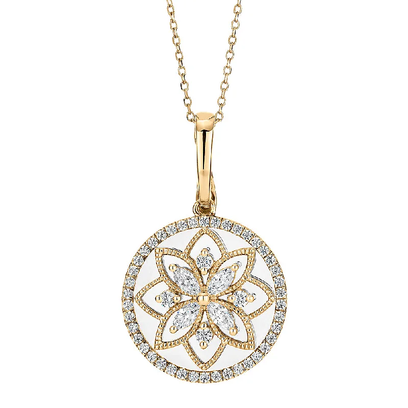 Fancy pendant with 0.64 carats* of diamond simulants in 10 carat yellow gold and sterling silver