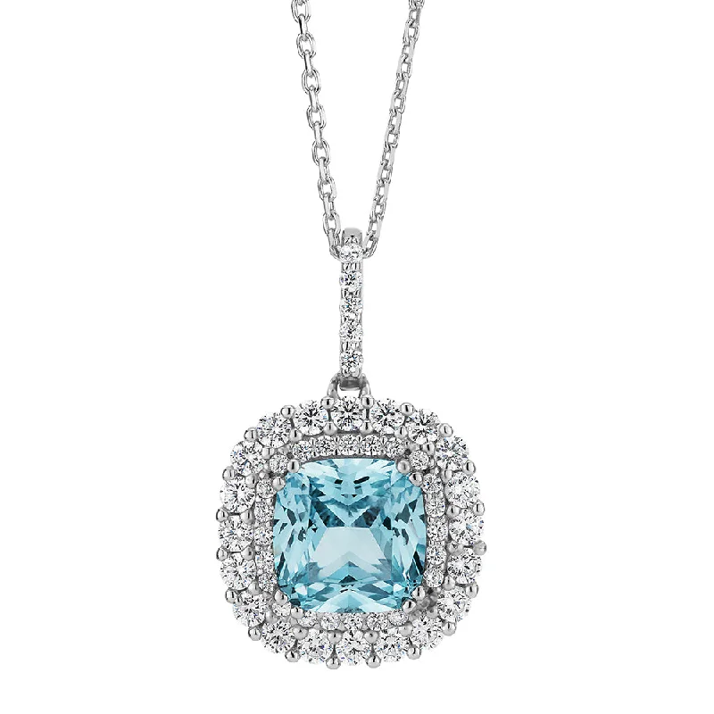 Affordable sterling silver necklaces for teensHalo necklace with blue topaz simulant and 0.73 carats* of diamond simulants in sterling silver