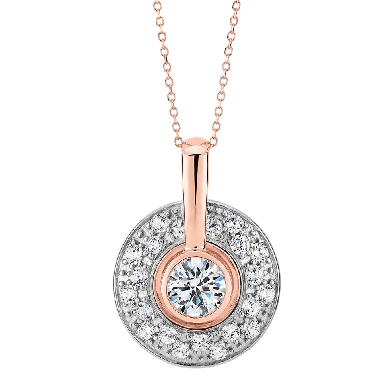 Crystal healing pendants for wellness enthusiastsHalo pendant with 1.75 carats* of diamond simulants in 10 carat rose gold and sterling silver