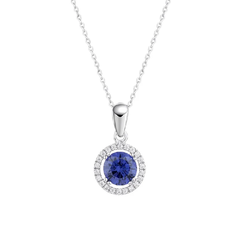 Initial letter necklaces for personalized styleHalo pendant with tanzanite simulant and 1.13 carats* of diamond simulants in 10 carat white gold